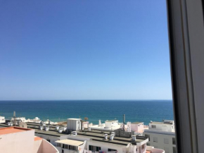 Отель Apartamento Quarteira T1  Картейра
